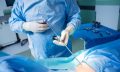 Surgeon Performs Endoscopic Microdiscectomy Of Herniated Interve