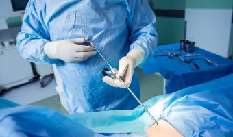 Surgeon Performs Endoscopic Microdiscectomy Of Herniated Interve