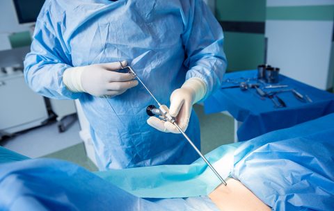 Surgeon Performs Endoscopic Microdiscectomy Of Herniated Interve